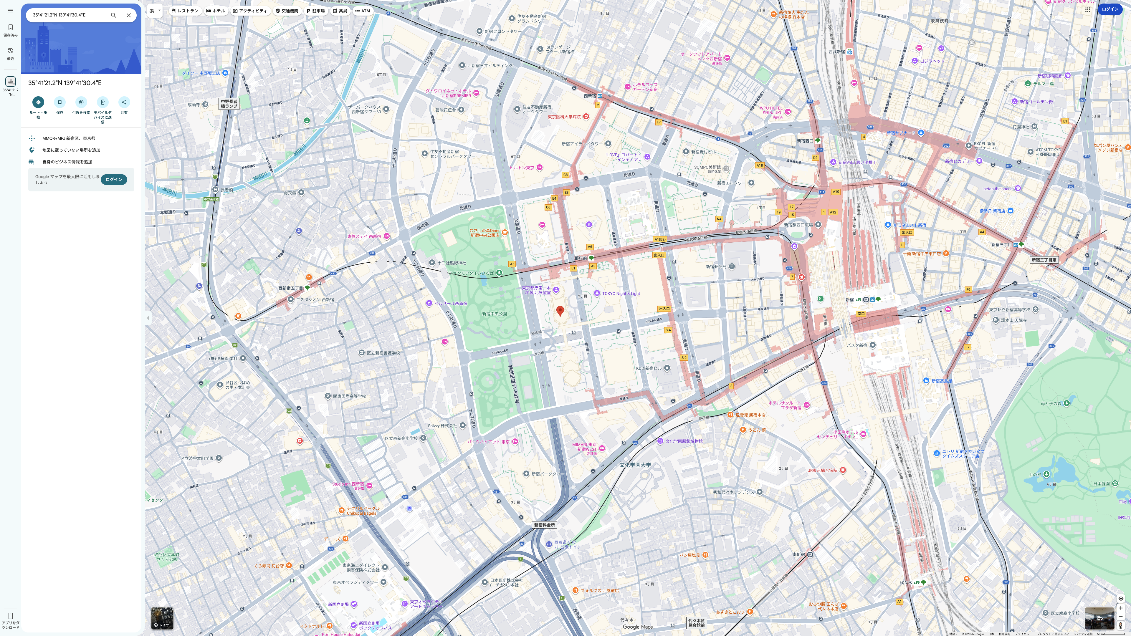 A standard Google Maps view opened at an in-game location, showing a pin near the Tokyo Metropolitan Government Building, Shinjuku Central Park, and Shinjuku Station.